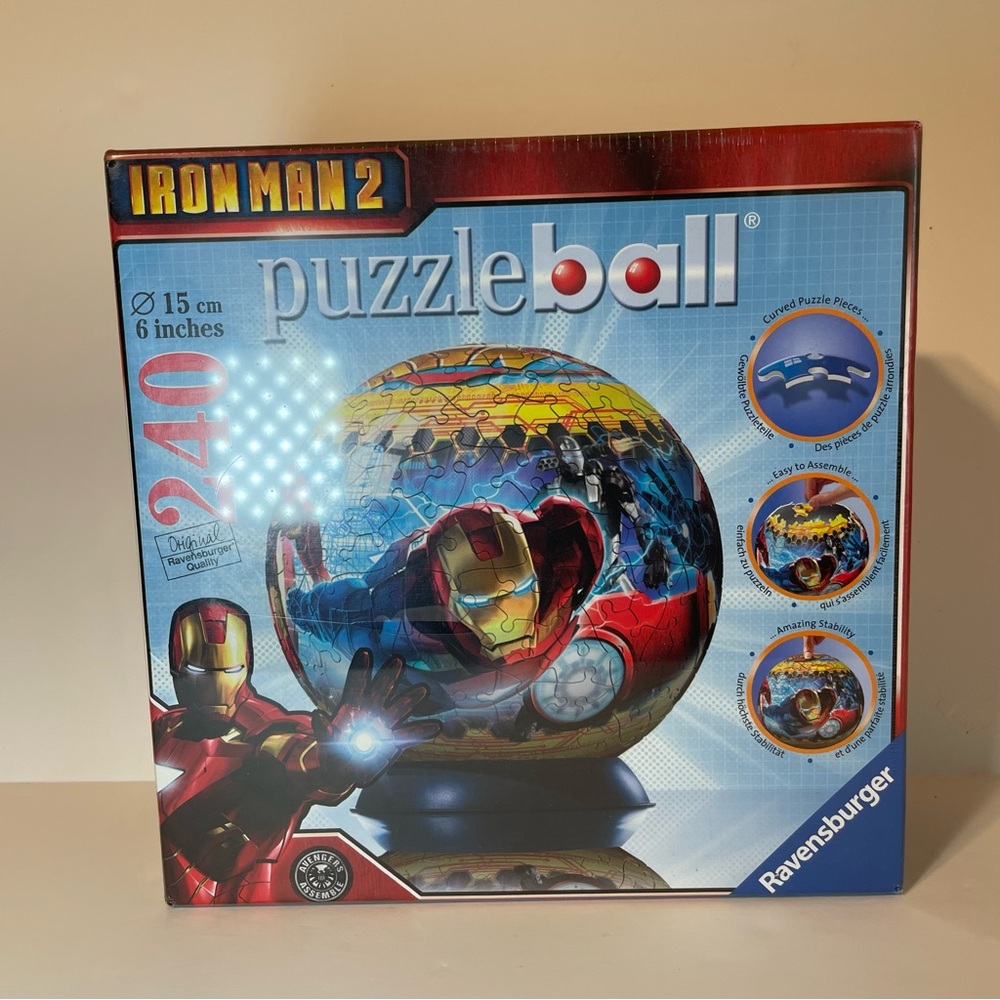 New Sealed Ravensburger Iron Man 2
Puzzle Ball 240pc Round Puzzle No.
115273